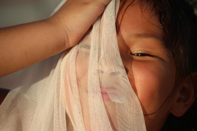 Close-up of a malnourished child in a Yemeni hospital, with visible signs of severe malnutrition. Medical staff are attending to the child, and the sterile environment contrasts sharply with the child's condition, emphasizing the urgency of the humanitarian crisis.